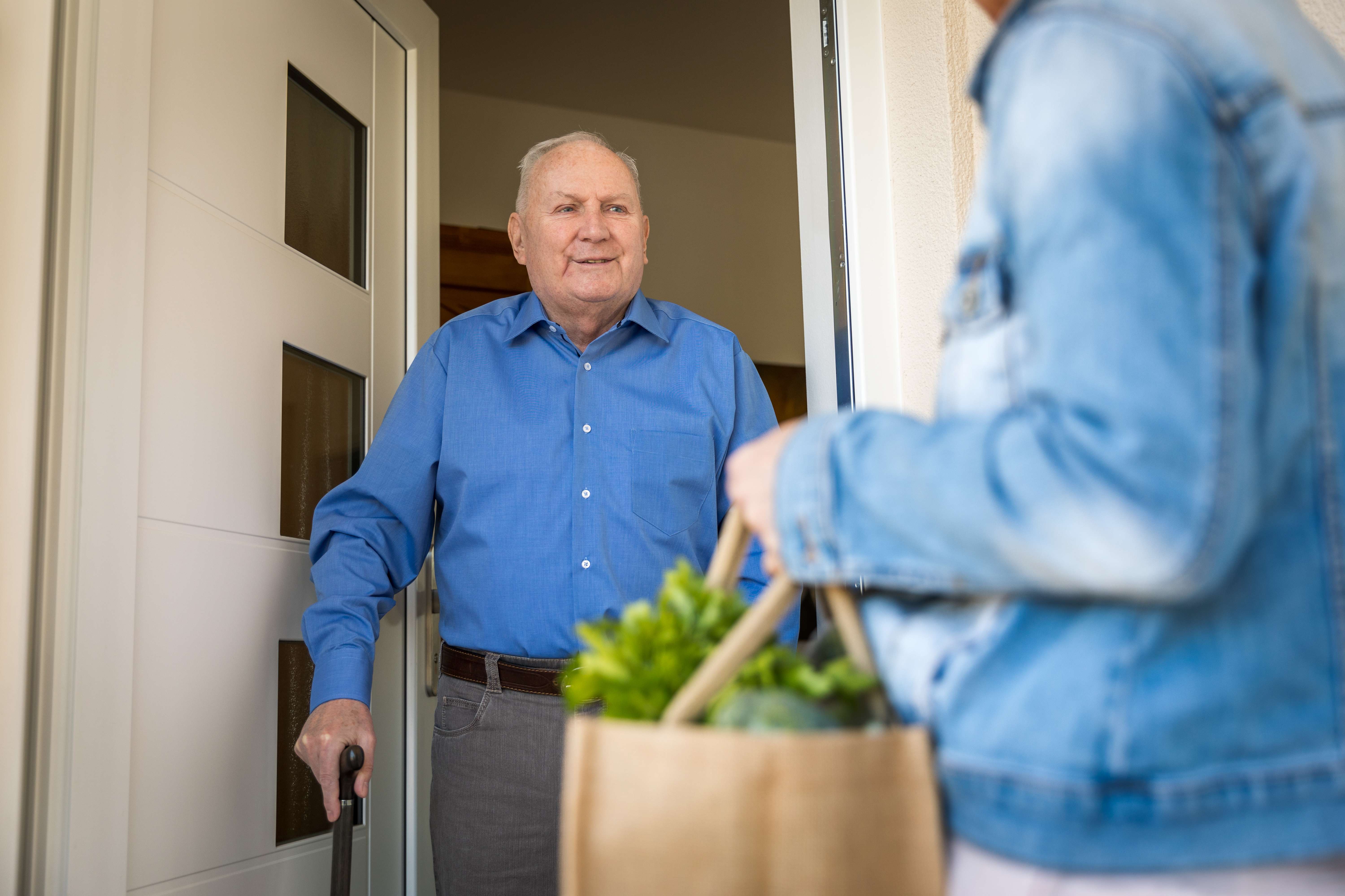 Quarantine – woman helping senior man