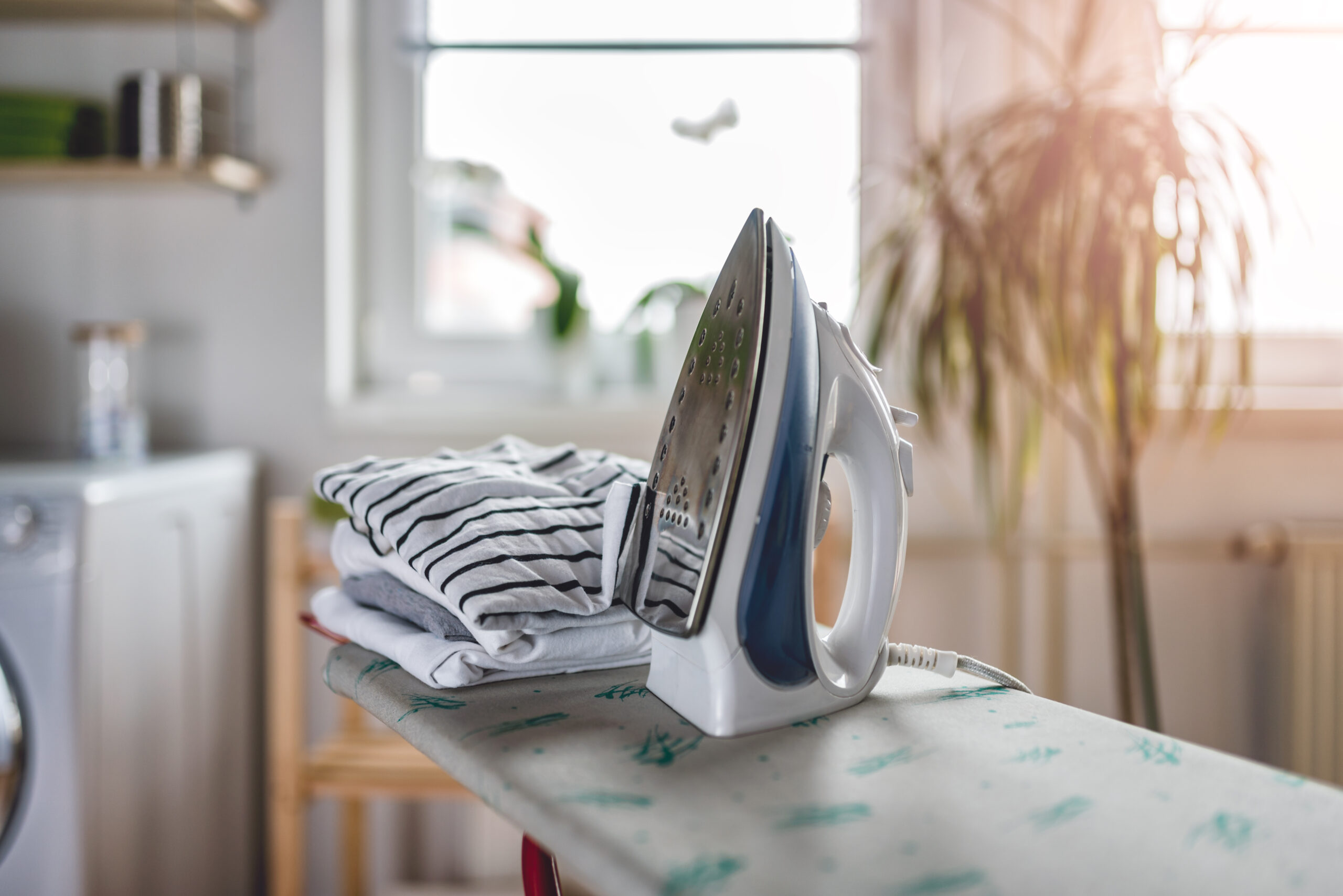 Ironing in the laundry room